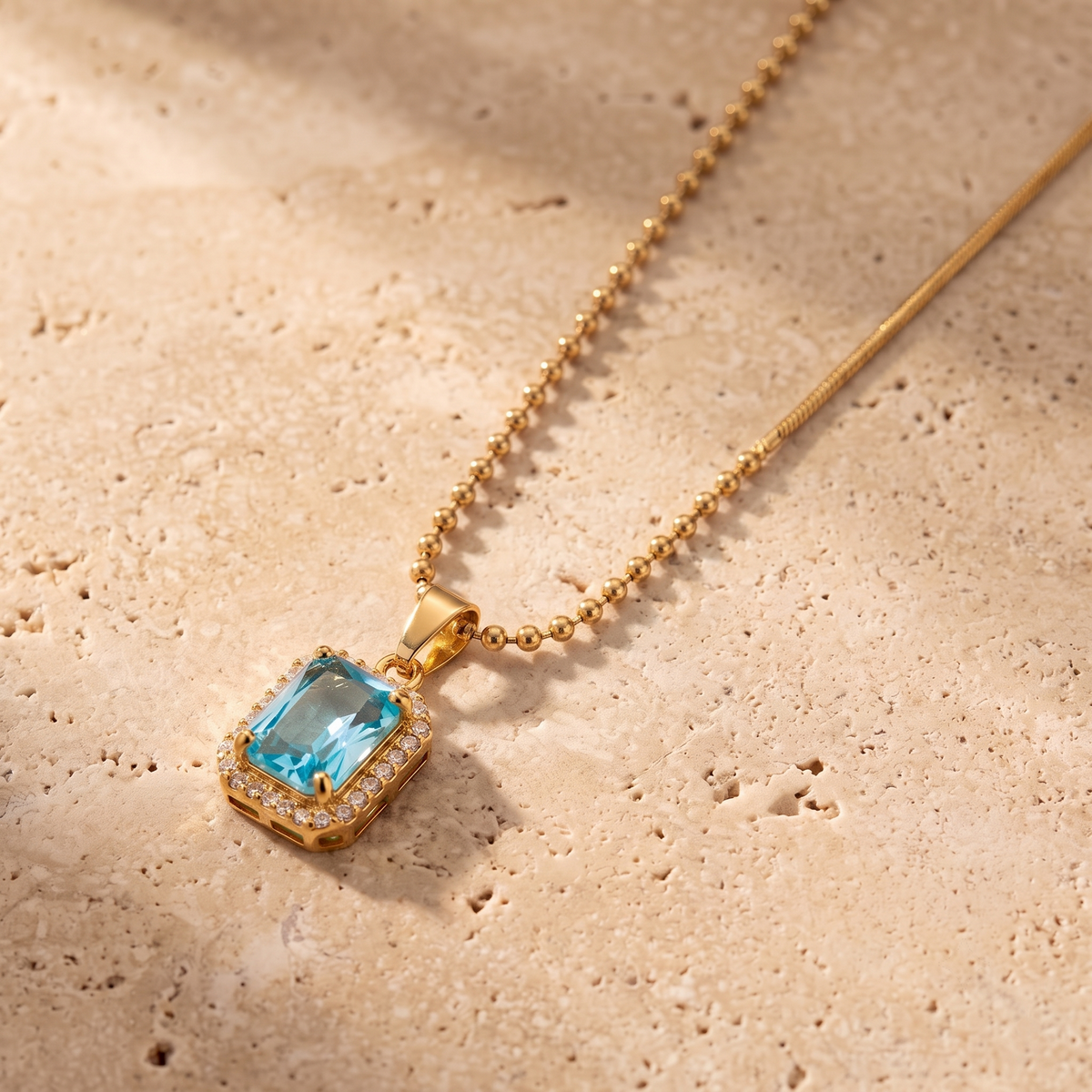 Aqua Crystal Emerald-Cut Halo Asymmetric Necklace Pendant